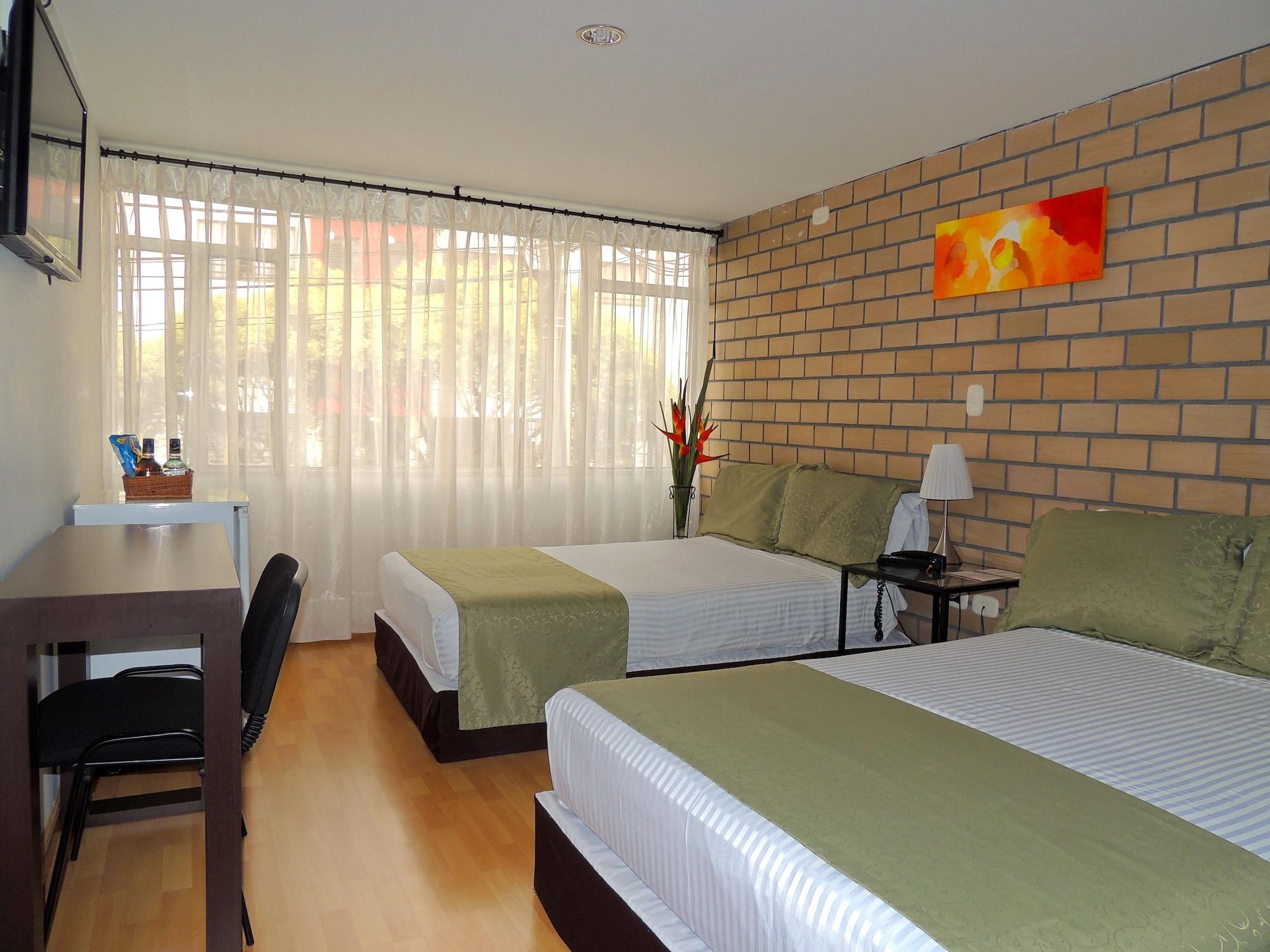 Hotel Portal De Milan Манисалес Екстериор снимка