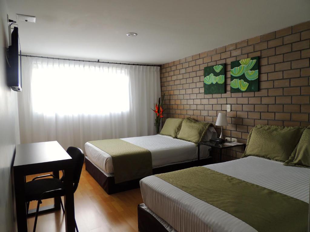 Hotel Portal De Milan Манисалес Стая снимка